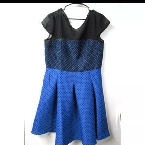 black and blue polka dot dress by Danny & Nicole.